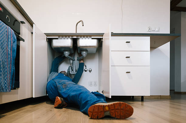 Professional Emergency Plumber technician working in Randolph, MA